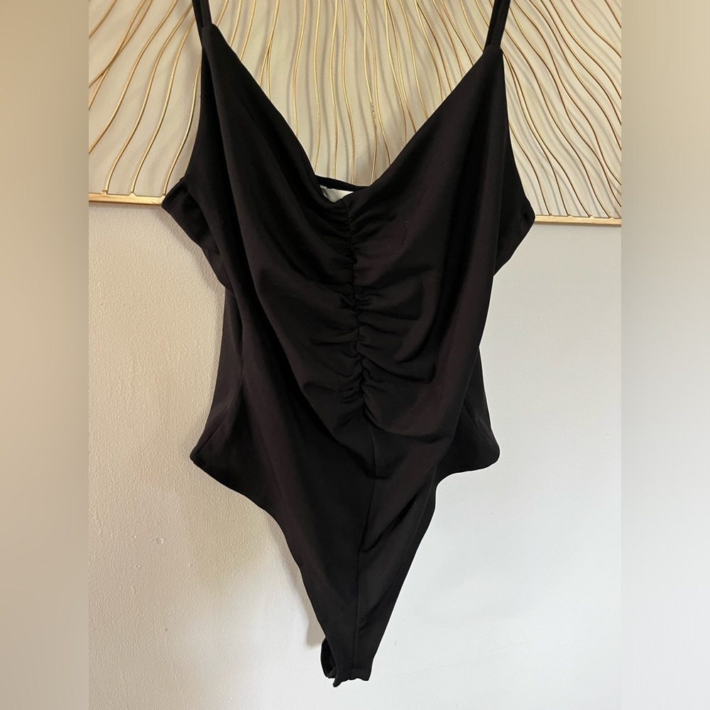 H&M NWOT black body suit, Size M